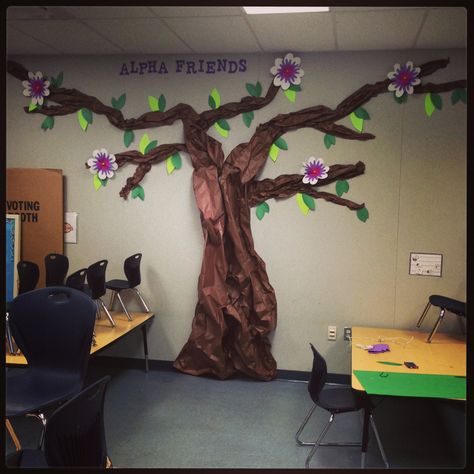 Our almost finished butcher paper tree for our preschool classroom. We made over sized paper leaves and over sized layered paper flowers. Butcher Paper Tree, Paper Tree Classroom, Tree Classroom, Bulletin Board Tree, Classroom Tree, Classroom Preschool, Tree Branch Wall Decor, Preschool Decor, Tree Mural