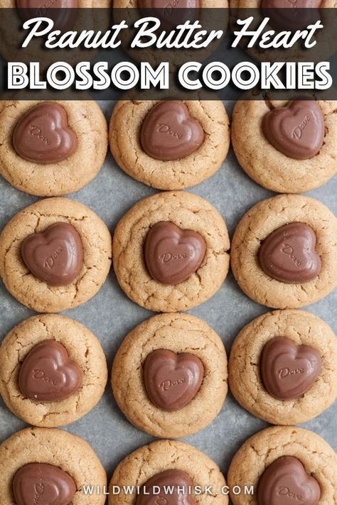 These Peanut Butter Blossom Cookies use a heart shape chocolate candy to turn a classic recipe into an easy Valentine's Day treat. #wildwildwhisk #peanutbutter #peanutbuttercookies #peanutbutterblossoms #cookies #cookierecipe #valentines #valentinesday Heart Shape Chocolate, Valentines Recipes, Flavor Pairing, Peanut Butter Blossom, Peanut Butter Kiss, Peanut Butter Kiss Cookies, Peanut Butter Blossom Cookies, Heart Chocolate, Valentines Baking