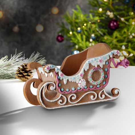 How sweet is this 13" gingerbread sleigh, with holiday cheer and icing baked right in! Crafted of resin, with a peppermint and snowflake detail this piece is perfect for tabletop display. Gingerbread Sleigh, Diy Styrofoam Crafts, Christmas Sleighs, Pastel Gingerbread, Decor Natal, Gingerbread Ideas, House Cookies, Styrofoam Crafts, Gingerbread House Designs