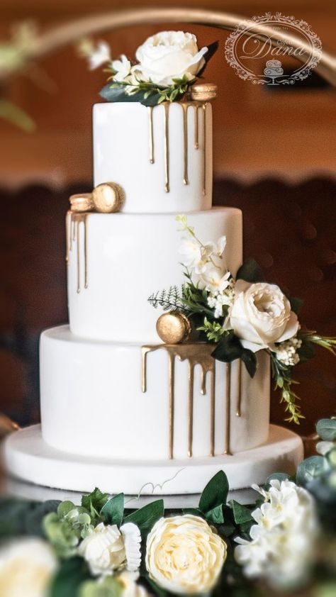 Gold Drip Wedding Cake With Flowers, White Gold Cake Wedding, Drip Wedding Cakes, Drip Wedding Cake Ideas, Simple Wedding Cake White And Gold, Green Gold And White Wedding Cake, Wedding Cakes Greenery, Non Fondant Wedding Cakes, Olive Green Wedding Cake Ideas