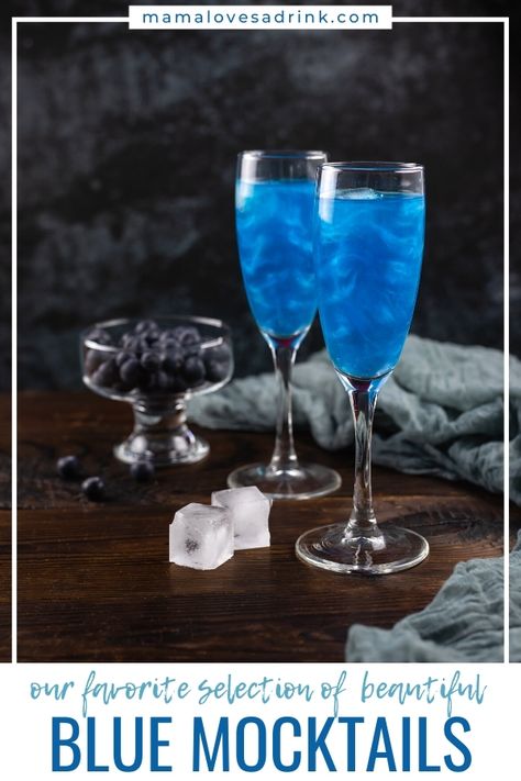 Get creative behind the bar this summer trying these clever and creative blue mocktail recipes. They look just like the real thing but without the booze | Alcohol-free blue cruracao syrup and blueberries star in these alternative recipes sure to bring some sparkle to your next blue-themed celebration, 4 July drinks to ocean-themed parties | Mama Loves A Drink Blueberry Mocktail Non Alcoholic, Space Themed Mocktails, Blue Glitter Cocktail, Starry Night Theme Drinks, Non Alcoholic Blue Drinks, Edible Glitter Drinks Non Alcoholic, Gold Mocktails Non Alcoholic, Blue Non Alcoholic Drinks, Flamingo Mocktails