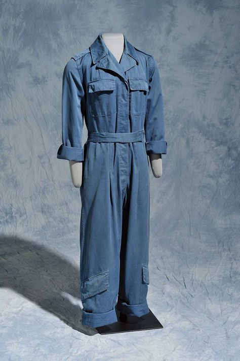 #TextileTuesday! Kate Lee Adams of Durham wore these blue cotton twill flight coveralls as a Woman Airforce Service Pilot (WASP) during #WWII. A group of civilian volunteers trained by the Army, the WASPs flew military planes in non-combat situations to free up male pilots for battle missions. Because the women were issued used men’s airplane mechanics’ coveralls, most had to roll up the sleeves and cuffs as shown here. Mechanic Jumpsuit Women, Mechanics Overalls, Wwii Women Uniform, Pilot Jumpsuit, Mechanic Uniform, Pilot Outfit, Mechanics Uniform, Mechanic Overalls, Mechanic Clothes