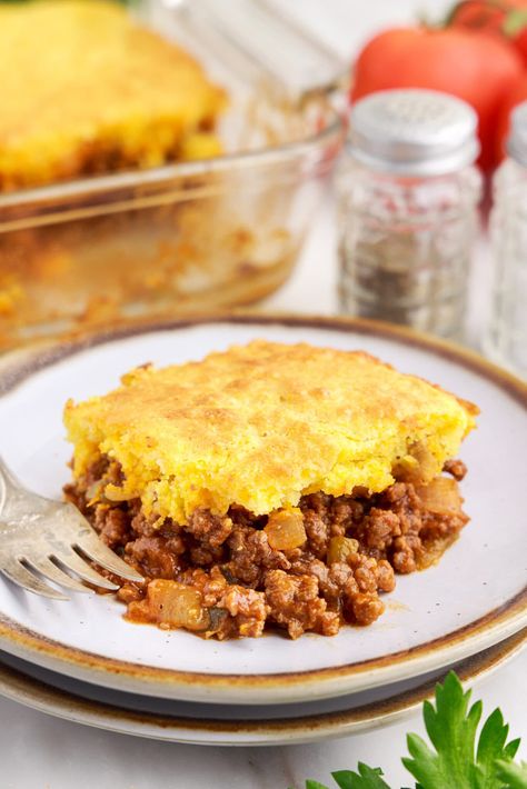 Sloppy joe cornbread casserole is a hearty and comforting hot dish made with tangy, savory sloppy joe meat then piled with sweet cornbread on top. Sloppy Joe Cornbread Casserole, Sloppy Joe Cornbread, Chili Cornbread Casserole, Friendsgiving Food Ideas, Chili Cornbread, Sloppy Joe Casserole, Sandwhich Recipes, Friendsgiving Food, Comforting Dinner