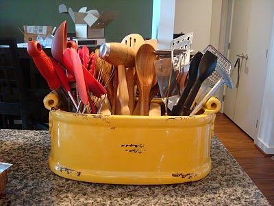 Kitchen Utensil Organizer made out of a vintage enamel planter Crock Ideas, Utensil Organizer, Eastern North Carolina, Ceramic Utensil Holder, Worker Bee, Kitschy Kitchen, Utensil Crock, Utensil Organization, Dining Table Centerpiece