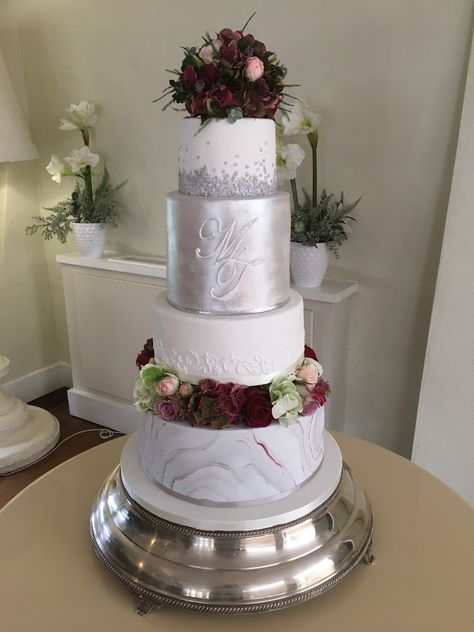 Madison, 4 tier cake with silver grey and burgundy colour theme with blush pink accents in the fresh flowers.  Handpiped monogram. 4 Tier Cake, Pink And Burgundy Wedding, 4 Tier Wedding Cake, Burgundy Colour, Silver Cake, Marble Wedding, Candy Cakes, Themed Wedding Cakes, Colour Theme