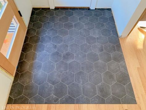 If you want the look of ceramic or porcelain tile but not the price tag or hassle, try groutable vinyl tile instead. It's affordable, easy to install, durable, water-resistant, and looks great! We just installed groutable vinyl tile in our entry; here's our DIY-friendly project tutorial. Get all the sources and more details in my original blog post. What is Groutable Vinyl Floor Tile? Vinyl flooring ranges from planks to sheet products, and today we’re talking about peel-and-stick ti… Schluter Tile Edge, Groutable Vinyl Tile, Porcelain Tile Floor Kitchen, Inexpensive Flooring, Floor Makeover, Peel And Stick Floor, Vinyl Floor Tiles, Tile Edge, Tile Stencil