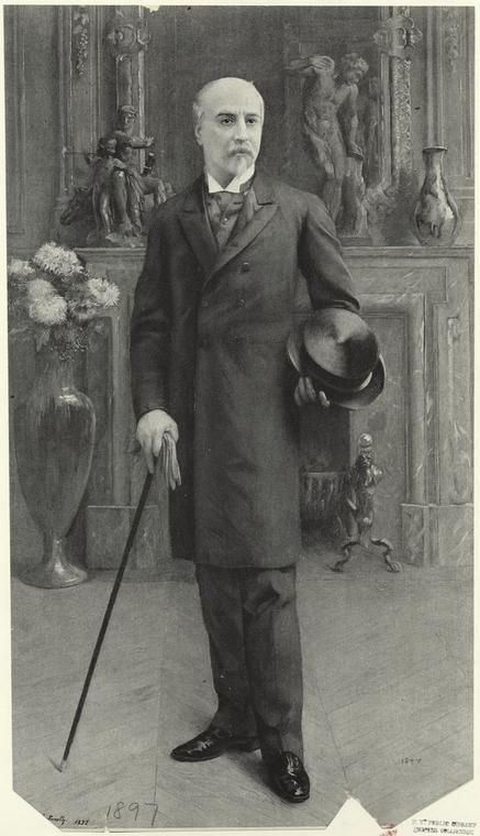 An unidentified man, "With Hat And Cane", c.1897. High society men's fashion during America's Gilded Age. Also a view of the home's interior, and an elaborate mantel/fireplace. ~ {cwl} ~ (Image: NYPL) 1899 Mens Fashion, Gilded Age Fashion Men, 1890s Mens Fashion, 1800s Mens Fashion, Victorian Mens Fashion, Victorian Mens Clothing, Progressive Era, Mantel Fireplace, Victorian Gentleman