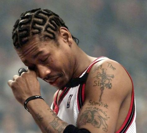 Philadelphia 76ers' guard Allen Iverson rubs his e Allen Iverson Braids, Zig Zag Braids, Iverson Braids, Afro Hair Fade, Cornrow Braids Men, Zig Zag Braid, Hair Twists Black, Cornrow Braid Styles, Cornrow Hairstyles For Men