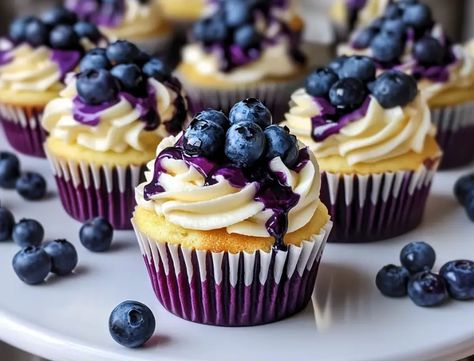 White chocolate blueberry cheesecake cupcakes White Chocolate Blueberry Cheesecake, Chocolate Blueberry Cheesecake, Blueberry Cheesecake Cupcakes, Chocolate Blueberry, Rich Cheesecake, Fancy Cupcakes, White Chocolate Cheesecake, Blueberry Sauce, Melting White Chocolate