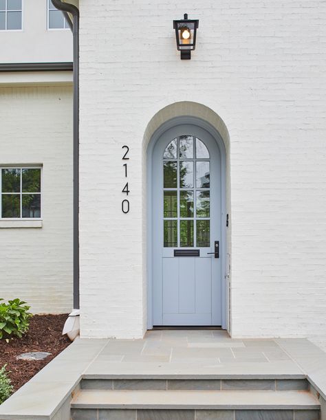 This Family's Breezy Home Is Ideal For Soaking Up The Tulsa Sun - House & Home Transitional Home Exterior, Arched Front Door, Front Door Steps, Calming Interiors, Blue Front Door, Home Exteriors, Door Design Photos, House Details, Number Design