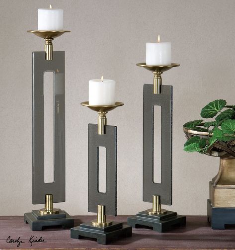 Painted, Coffee Bronze Metal With Textured, Smoke Glass And A Black Foot. Beige Candles Included. Sizes: Sm-5x15x5, Med-5x19x5, Lg-5x23x5 Candal Stand, Beige Candles, Metal Sheet Design, Gold Home Accessories, Modern Candle Holders, Floor Lamp Bedroom, Marble Candle, Candle Holder Decor, Pillar Candle Holders