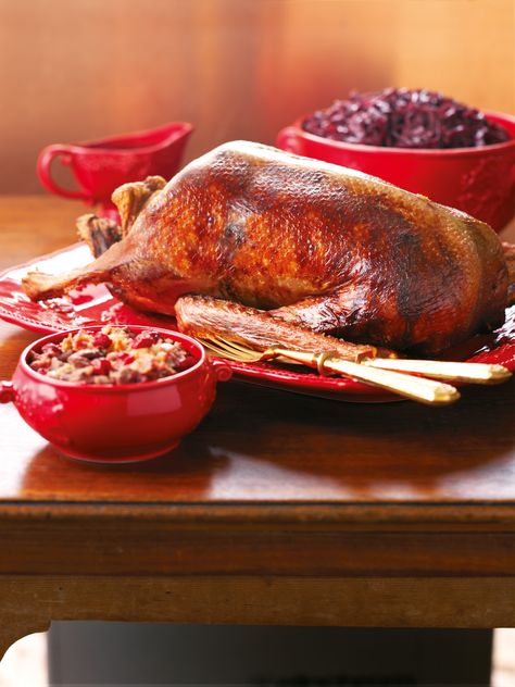 Roast Goose With Pear and Cranberry Stuffing Roast Goose Recipes, Nigella Christmas, Roast Goose, Cranberry Stuffing, Goose Recipes, Dried Pears, Christmas Roast, Nigella Lawson, Pomegranate Juice