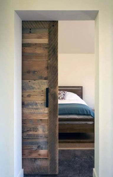 Reclaimed Salvaged Barn Wood Stunning Interior Pocket Door Designs Barn Door Bedroom, Interior Pocket Doors, Pintu Interior, Door Bedroom, Backyard Cottage, Aesthetic Bedroom Ideas, Pocket Door, Bedroom Doors, Stunning Interiors