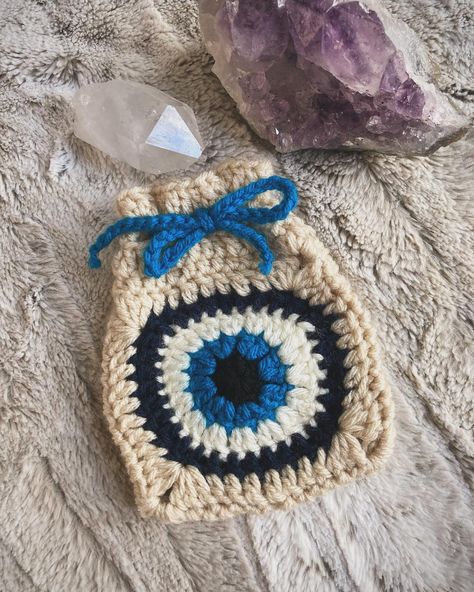 I finally got the pattern for my Evil Eye Protection Drawstring Pouch up on Etsy! 🧿 • • • #crochet #crochetpattern #etsy #etsyshop #theweavingwitchery #crochetbag #crochetbagpatterns #crochetevileye #evileyeprotection #evileyebag #witchy Crochet Tarot Card Pouch, Witchy Crochet, Crochet Tarot, Tarot Card Pouch, Evil Eye Protection, Crochet Goodies, Crochet Stuff, Mind Body Spirit, Crochet Bag Pattern