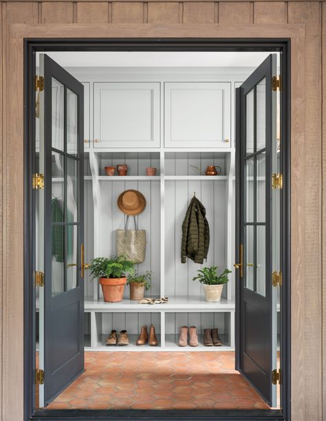 Katie Davis Design, White Foyer, Terra Cotta Tile, Katie Davis, Transitional Laundry Room, Mudroom Lockers, Farmhouse Style Table, Wicker Dining Chairs, Custom Storage