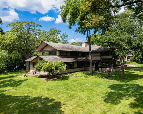 Prairie style homes: the ultimate guide and getting the look | Prairie Style Homes, Homes Inside, Wood Dining Room Table, Prairie Home, Prairie Style Houses, Wood Dining Room, Tufted Arm Chair, Hip Roof, Organic Architecture