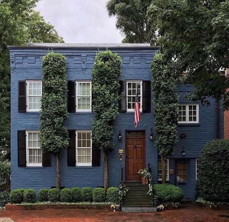 @scoutandnimble on Instagram: “The painted blue brick and shutters create for a beautiful exterior on this home. 💕 Every street needs a house like this one! 📷:…” Brick House With Blue Shutters, Blue Painted Brick House, Blue Brick House Exterior, Rowhouse Exterior, Grey Painted Brick House, Painting Brick Exterior, Grey Painted Brick, Bricks House, Brick House Exterior Makeover