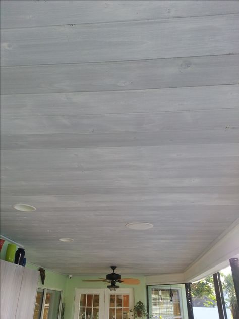 whitewashed wood ceiling over gray stain Painted Wood Ceiling, Raised Ceiling, Farmhouse Basement, Patio Ceiling, Gray Stain, Tongue And Groove Ceiling, Whitewashed Wood, Sunroom Ideas, Plank Ceiling