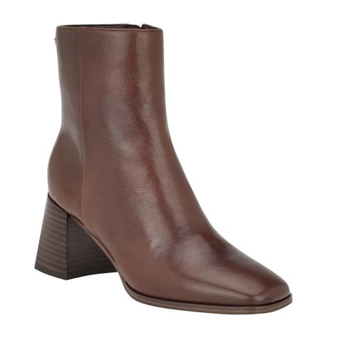 PRICES MAY VARY. All eyes will be on you as you walk in the super-sleek and chic Calvin Klein Broma booties. The Broma features a tapered block heel, modern square toe and stretchy gores on the side of the bootie. Founded in New York in 1968, the brand elevates everyday essentials to globally iconic status. Square Toe Zip Closure Imported 2.56" Heel Height Dress Booties, Contemporary Chic, Modern Square, Calvin Klein Woman, Dark Brown Leather, Mid Calf Boots, Dress And Heels, Leather Booties, Mid Calf