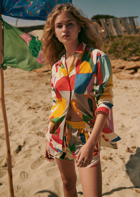 Introducing the Sézane x G.Kero Max Shirt in Geometrique Multico. This oversized long-sleeved shirt features a vibrant geometric print, chest pocket, and rounded hemline. Infused with the lively energy of Cap Ferret, the hand-drawn designs add joyful color and creativity to your summer wardrobe. Elevate your style with this iconic piece, complete with mother-of-pearl button fastening. Discover more at sezane.com. Summer Printed Blouse With Spread Collar, Summer Multicolor Long Sleeve Shirt, Multicolor Long Sleeve Summer Shirt, Summer Long Sleeve Multicolor Shirt, Multicolor Print Summer Blouse For Work, Summer Multicolor Print Blouse For Work, Summer Workwear Blouse In Multicolor Print, Parisian Studio, Shirt Prints