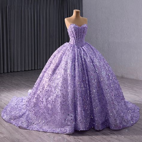 Stunning quinceañera dress in a vibrant purple hue, perfect for a 15th birthday celebration. Features a sweetheart neckline and a sleeveless design for a touch of elegance. Adorned with sparkling embellishments for added glamour and shine. Crafted with high-quality materials for a luxurious and comfortable feel. Flattering fit that enhances the feminine silhouette, creating a regal appearance. Ideal attire for young girls celebrating their quinceañera in style. Elevate the special occasion with Purple Sweet 16 Dresses, Dresses For 15, 18th Debut, Quinceanera Gowns, Purple Sweet 16, Quince Dresses Purple, Purple Quinceanera Dresses, Quincenera Dresses, 15 Girls