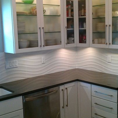 White linear wave tile - kitchen backsplash and shower wall Wave Backsplash, Kitchen Backsplash Images, Wave Tile, Creative Kitchen Backsplash, Backsplash White, Tile Kitchen Backsplash, Open Kitchen And Living Room, Condo Kitchen, Kitchen Backsplash Designs