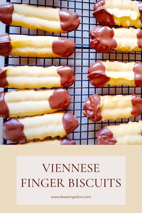 Golden Viennese Finger Biscuits dipped in chocolate at both ends, on a cooling rack. Descriptive graphics included. European Biscuits, Viennese Biscuits, Finger Biscuits, Chocolate Dip Recipe, Broken Biscuits, Tea Cake Stand, Bistro Menu, Yummy Biscuits, Shortbread Bars