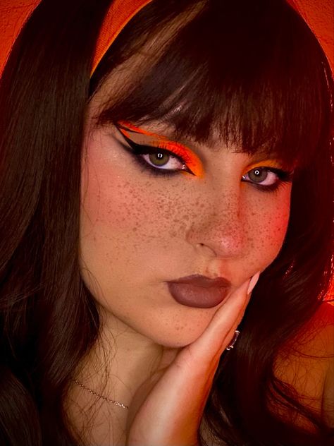 Orange Makeup | Halloween Makeup | Eyeliner | Black And Orange Makeup Orange And Black Graphic Liner, Black And Orange Eyeliner, Black And Orange Makeup, Orange Make Up, Orange And Black Makeup, Neon Orange Makeup, Halloween Makeup Eyeliner, Make Up Orange, Orange Eyeliner