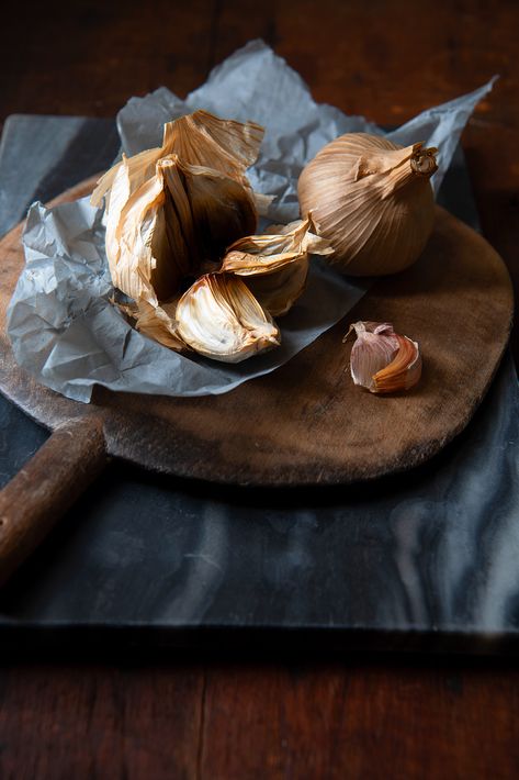 A staple of Asian cuisine for centuries, black garlic – the fermented lovechild of the bulbous original – is now becoming a regular in the shopping baskets of Britain’s discerning food lovers. Find out how to cook with it here... Garlic Storage, Raw Garlic, Black Garlic, Cooking Essentials, Garlic Recipes, Seasonal Food, Fresh Garlic, What To Cook, Find Recipes