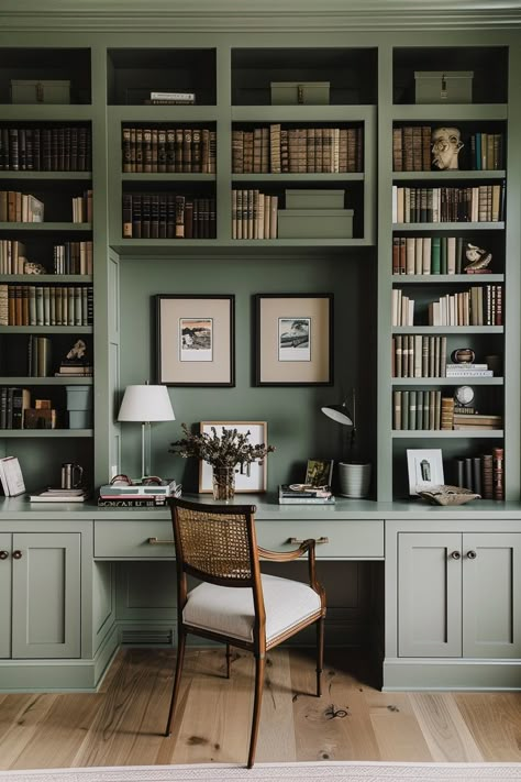 wall of built in bookshelves painted an olive green with a desk and desk chair Masculine Office Ideas, Masculine Office, Orlando