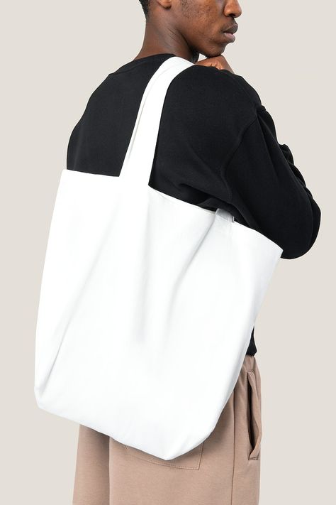 Download free image of Man carrying white tote bag studio shoot by Teddy about tote bag mockup, tote bag, black canvas bag, white shopping bag mockup, and bag mockup 2723619 Shopping Bag Mockup, Black Canvas Bag, Tote Bag Mockup, Upcycled Bag, Simple Tote, Free Tote, Men's Totes, White Tote Bag, Bag Mockup