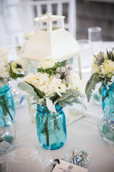 Oooh...something blue - love, love, love these blue Mason Jars for a Cape Cod beach wedding. www.thecasualgourmet.com Blue Mason Jar Centerpieces, Tiffany Blue Wedding Decorations, Babyshower Centerpieces, Turquoise Wedding Decorations, Wedding Centerpieces Diy Rustic, Quinceanera Bouquet, Bouquet Centerpiece, Wedding Jars, Wedding Centerpieces Mason Jars