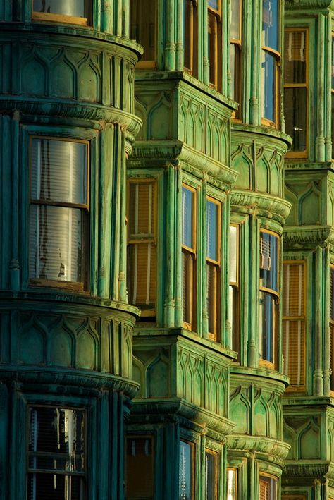 Columbus Tower in San Francisco, California, with its distinctive copper-green edifice, was designated landmark number 155 in the city. Green Architecture Aesthetic, Copper Architecture, Wizards House, Copper Building, Flat Iron Building, Glass Architecture, Building Green, Paris Green, American Architecture