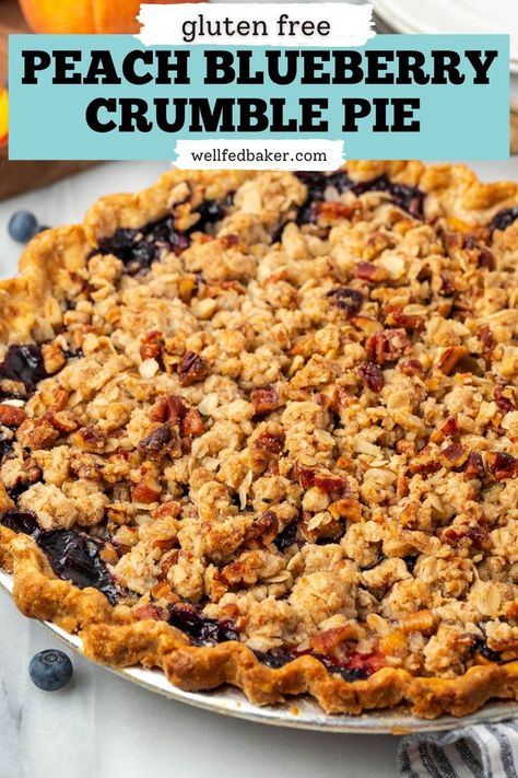 A whole peach blueberry crumble pie sitting on a white table. Blueberry Peach Pie, Peach Blueberry Crumble, Blueberry Crumble Pie, Oatmeal Crumble Topping, Crumble Pie, Berry Recipes, Peach Blueberry, Fresh Fruit Recipes, Pie Crumble