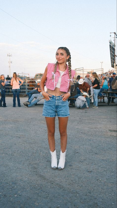 Girl wearing hot pink cowgirl vest and white cowgirl boots Rodeo Barbie Outfit, Country Barbie Outfits, Barbie Spirit Week Outfit, Barbie Vibes Outfit, Barbie Outfits Spirit Week, Barbie Spirit Week, Cowgirl Barbie Outfit, Barbie Cowgirl Outfit, Rodeo Barbie