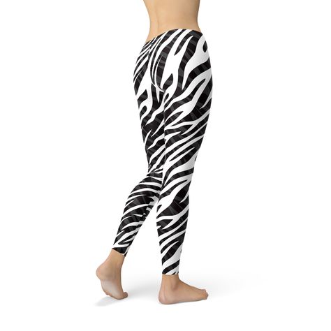 Even with their simple black and white color scheme, these Womens Zebra Stripes Leggings will make a sassy statement. Featuring a traditional zebra animal print design, these cropped leggings can be worn so many ways and adapt to any personal style preference. Wear these to the gym for enduring comfort or for an everyday athleisure look. Pair it with combat boots and a studded vest for a sexy chic rocker look.These premium full length women's leggings offers the perfect combination of performanc Zebra Leggings, Womens Printed Leggings, Rocker Look, Animal Print Design, Zebra Animal, Athleisure Leggings, Printed Tights, Spandex Pants, Zebra Stripes