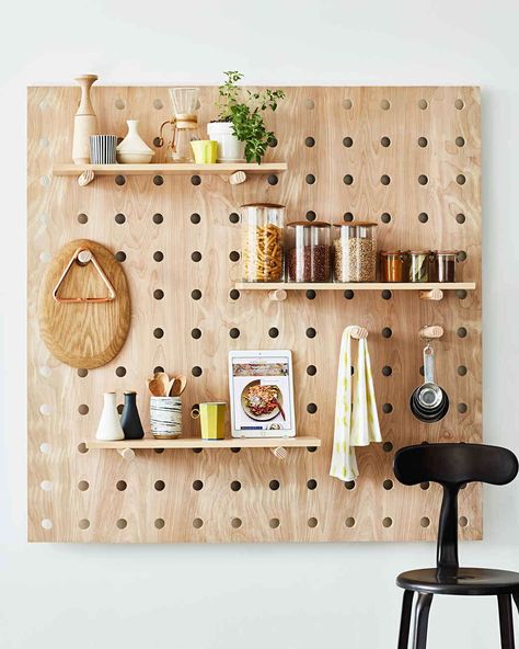 space-saver-peg-board-103085273-onecms Paper Helmet, Pegboard Kitchen, Wooden Pegboard, Stackable Plastic Storage Bins, Kitchen Wall Units, Pegboard Display, Paper Furniture, Kitchen Clutter, Small Kitchen Storage