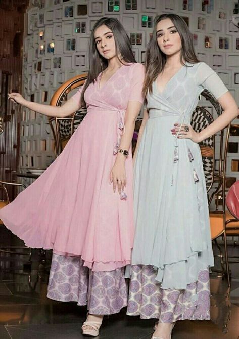 Baby Pink anarkali suit with asymmetrical hemline team up with printed plazzo is a latest trend of suits. You can wear this in any festival or family function. Long Kurti With Plazzo Style, Baby Frock Design, Simple Kurti Designs, Baby Frock, Pakistani Dresses Casual, Long Dress Design, Indian Dresses Traditional, Traditional Indian Outfits, Indian Gowns Dresses