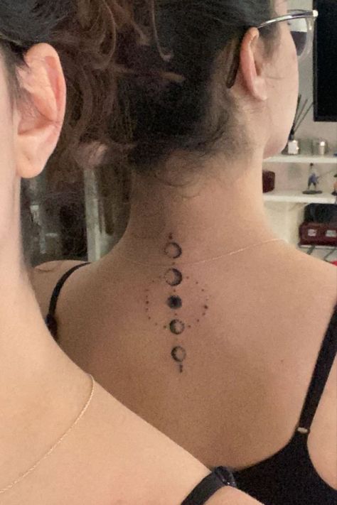 26 Celestial Star Neck Tattoo Ideas For Beauty Moon Phases Tattoo With Quote, Moon Phases On Spine, Moon Phases Back Tattoo Women, 3 Moon Phases Tattoo, Moon Phase Hip Tattoo, Back Moon Phases Tattoo, Moon Tattoo Neck Back, Moon Phases Tattoo Placement, Moon Phases Ear Tattoo