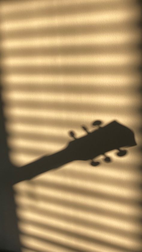 Silhouette of the guitar head with the golden hour of the sun through the shades The Golden Hour, Celebrating Life, Golden Hour, The Golden, The Sun, Guitar, Shades, Sun