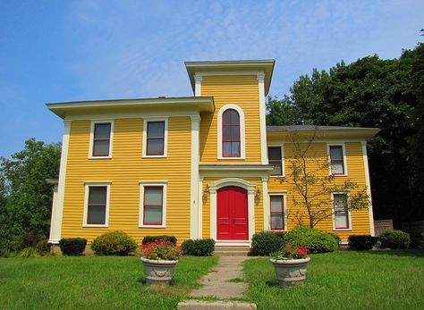 Houses with Red Doors | Yellow House, Red Door | Flickr - Photo Sharing!  and two guards Mustard Yellow House Exterior, Red Door House, Yellow House Exterior, New Orleans Style Homes, Red Roof House, Outside House Colors, Red Roof, Yellow Houses, House Color Schemes