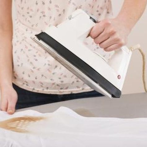 It's easy to remove burn marks like these. Iron Burn On Clothes How To Remove, Iron Burn, Stain On Clothes, Coastal Dining, Burn Mark, Laundry Room Remodel, Interiors Magazine, Room Remodel, Fabric Ottoman