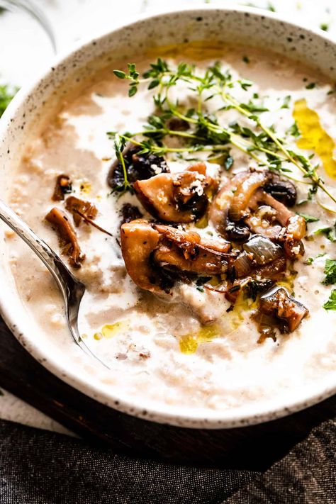 Enjoy a satisfying, hearty bowlful of homemade Cream of Mushroom Soup with Rice! This is an easy soup recipe made from earthy mushrooms blended with onions, garlic, and a hint of thyme, then finished with cream and white rice. Cream Of Mushroom Rice, Easy Mushroom Soup, Soup With Rice, Easy Soup Recipe, Mushroom Soup Recipe, Cold Weather Comfort Food, Creamy Crab, Creamy Mushroom Soup, Mushroom Rice