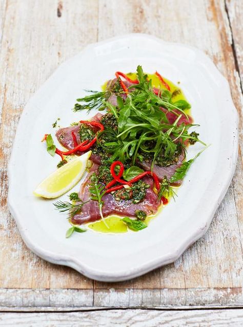 Sicilian-style tuna carpaccio | Jamie Oliver | Food | Jamie Oliver (UK) Tuna Carpaccio Recipe, Tuna Carpaccio, Carpaccio Recipe, Jamie Oliver Recipes, Tuna Recipes, Think Food, Jamie Oliver, Fish Dishes, Meals For Two