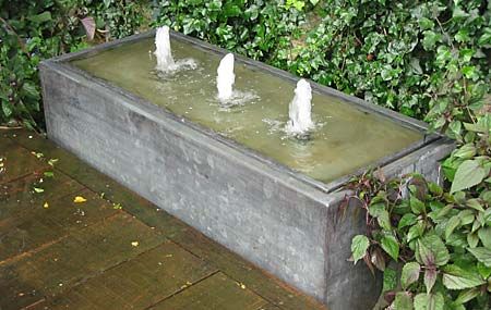 Brimming Water Feature in a faux-lead trough (© aquapic)) Garden Water Features Wall, Trough Water Feature Diy, Water Trough Fountain, Trough Water Feature, Trough Fountain, Water Spouts, Water Feature Wall, Outdoor Water Feature, Small Water Features