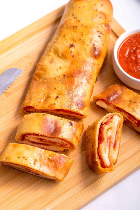 Pepperoni bread is always a crowd-pleaser. With pepperoni, loads of Italian seasoning, and cheese, you really can't go wrong. Pepperoni Appetizers, Pepperoni Cheese Bread, Pepperoni Bread Recipe, Pepperoni Rolls Recipe, Pepperoni Bread, Pepperoni Recipes, Pizza Bread Recipe, Pepperoni Rolls, Frozen Bread Dough