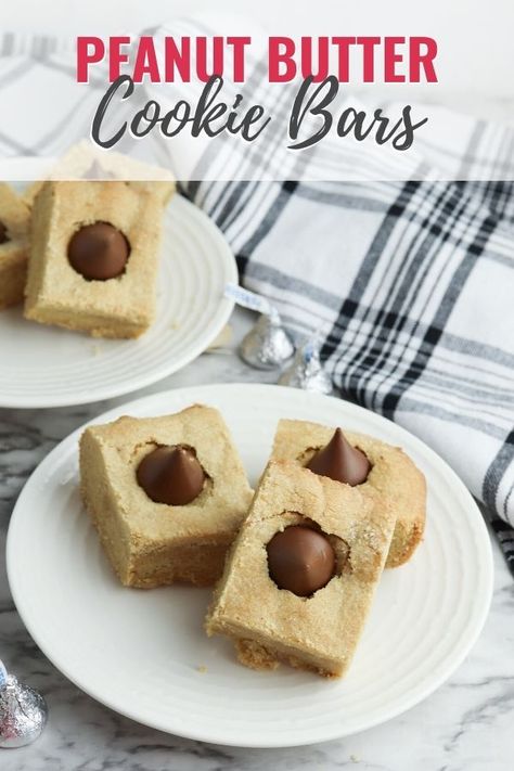 These Peanut Butter Cookies Bars are bound to be a hit! This recipe for peanut butter blossom bars will have your family hooked. Blossom Bars, Dessert Bars Recipes Easy, Butter Cookie Bars, Peanut Butter Blossoms Recipe, Peanut Butter Kiss, Peanut Butter Blossom, Easy Dessert Bars, Peanut Butter Cookie Bars, Peanut Butter Kiss Cookies