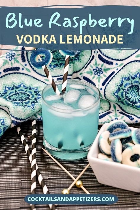 This blue raspberry cocktail is a light and fruity drink with a gorgeous summery color! Combine blue raspberry lemonade with Svedka vodka  to make delicious mixed summer drinks. Garnish with gummy rings for a fun and creative garnish idea. An easy alcoholic drink to make and you can easily turn it into a frozen vodka cocktail if you like. One of our favorite summer drink recipes. Blue Raspberry Vodka Drinks, Sweet And Sour Drink, Raspberry Vodka Drinks, Raspberry Lemonade Vodka, Blue Alcoholic Drinks, Summer Vodka Drinks, Alcoholic Drinks Vodka, Gummy Rings, Blue Raspberry Lemonade