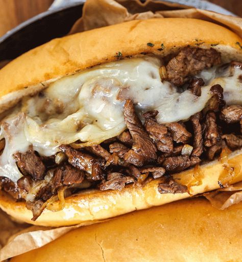 15 Super Bowl Recipes for Eagles Fans - PureWow Eagles Tailgate Food, Eagles Game Day Food, Philadelphia Eagles Tailgate Food, Philadelphia Eagles Themed Food, Philadelphia Eagles Party, Philly Cheesesteak Dip, Eagles Tailgate, Cheesesteak Dip, Gameday Recipes