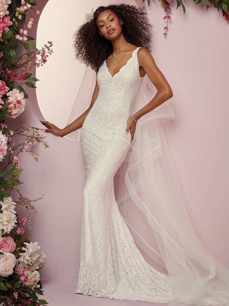 Rebecca Ingram - TINA, Comprised of soft allover lace, this sheath boho wedding dress features chic straps and a V-neckline. V-back is accented with illusion and lace motifs. Lined with Inessa Jersey for an elegant fit. Finished with covered buttons over zipper closure. Tulle veil accented in lace and edged with horsehair sold separately. Available in plus size. Fitted Wedding Gown, Rebecca Ingram, Sheath Wedding Dress Lace, Boho Bridal Gowns, Maggie Sottero Wedding Dresses, Wedding Dress Boutiques, Affordable Wedding Dresses, Classic Wedding Dress, Maggie Sottero